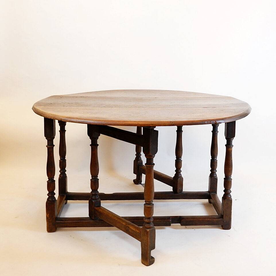 19th century English drop-leaf table with turned legs