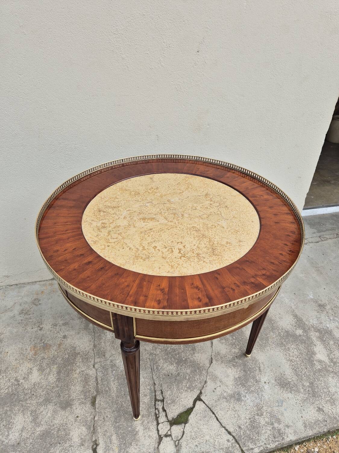 Louis XVI style mahogany bouillotte table in marquetry and bronze