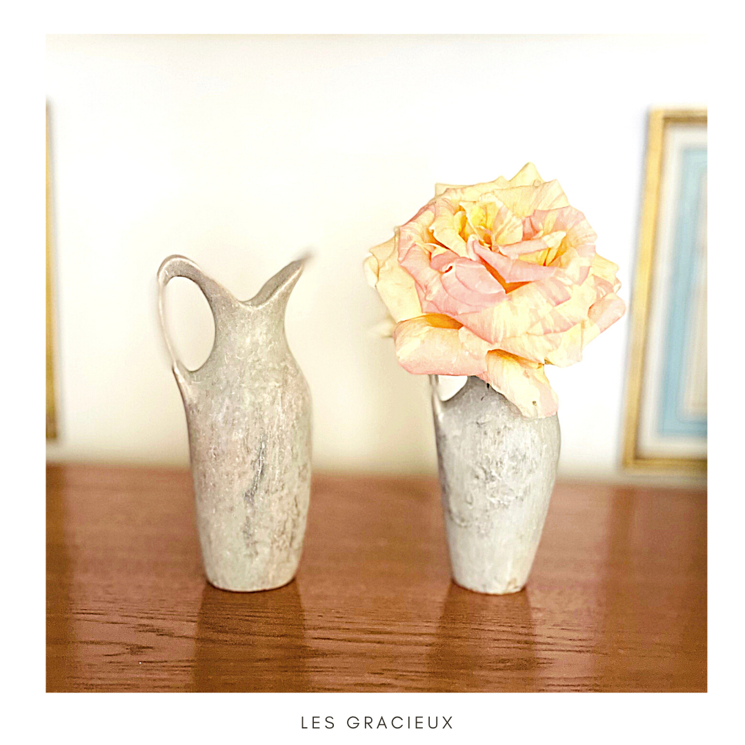 2 jugs in rough cut stone