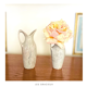 2 jugs in rough cut stone