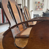 Pair of Art Deco armchairs in wood and cane.