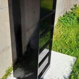 Black metal clamshell cabinet