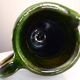Pitcher vase, thick green glazed terracotta, signature to be identified
