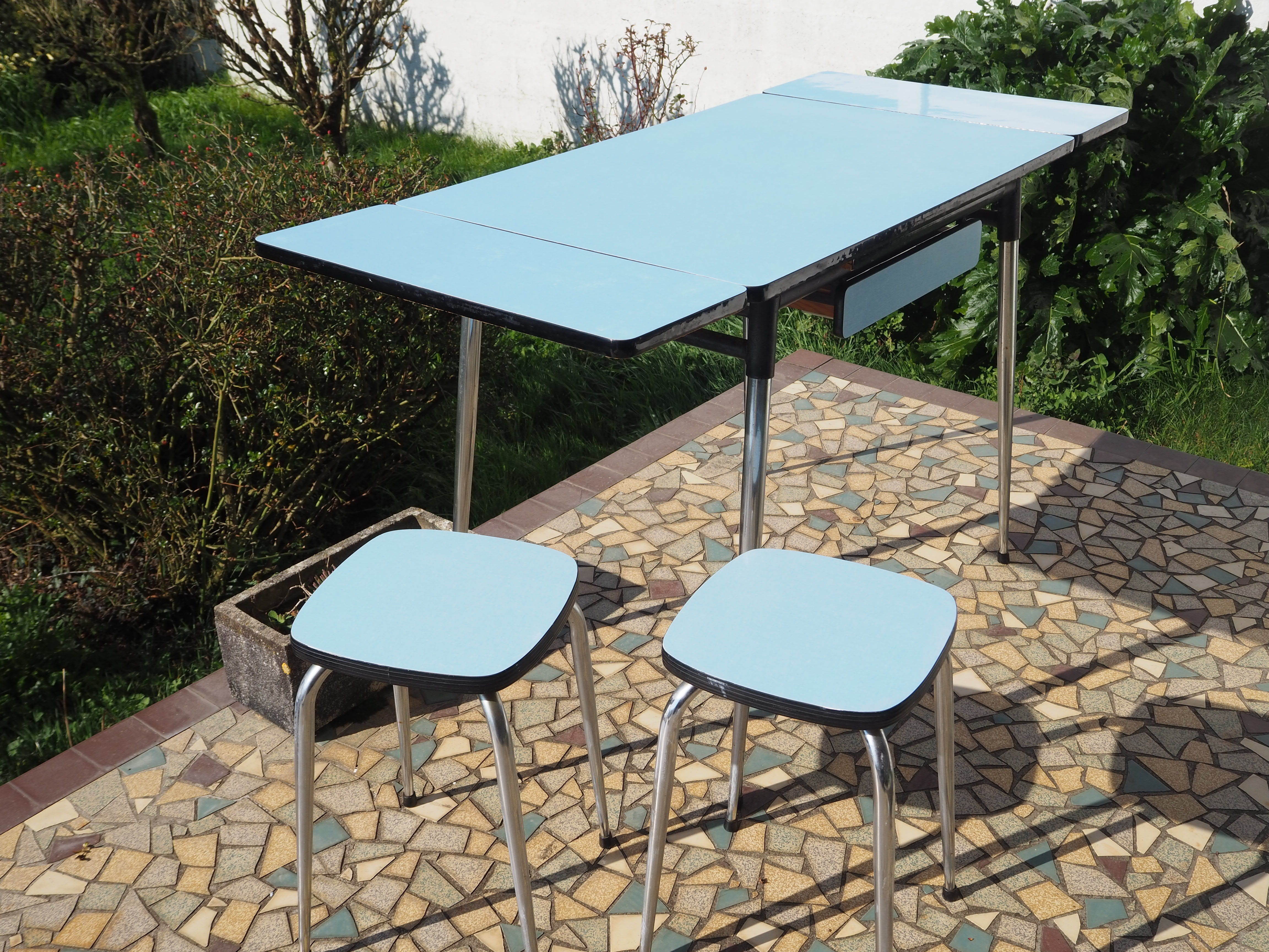 Blue formica table and two stools