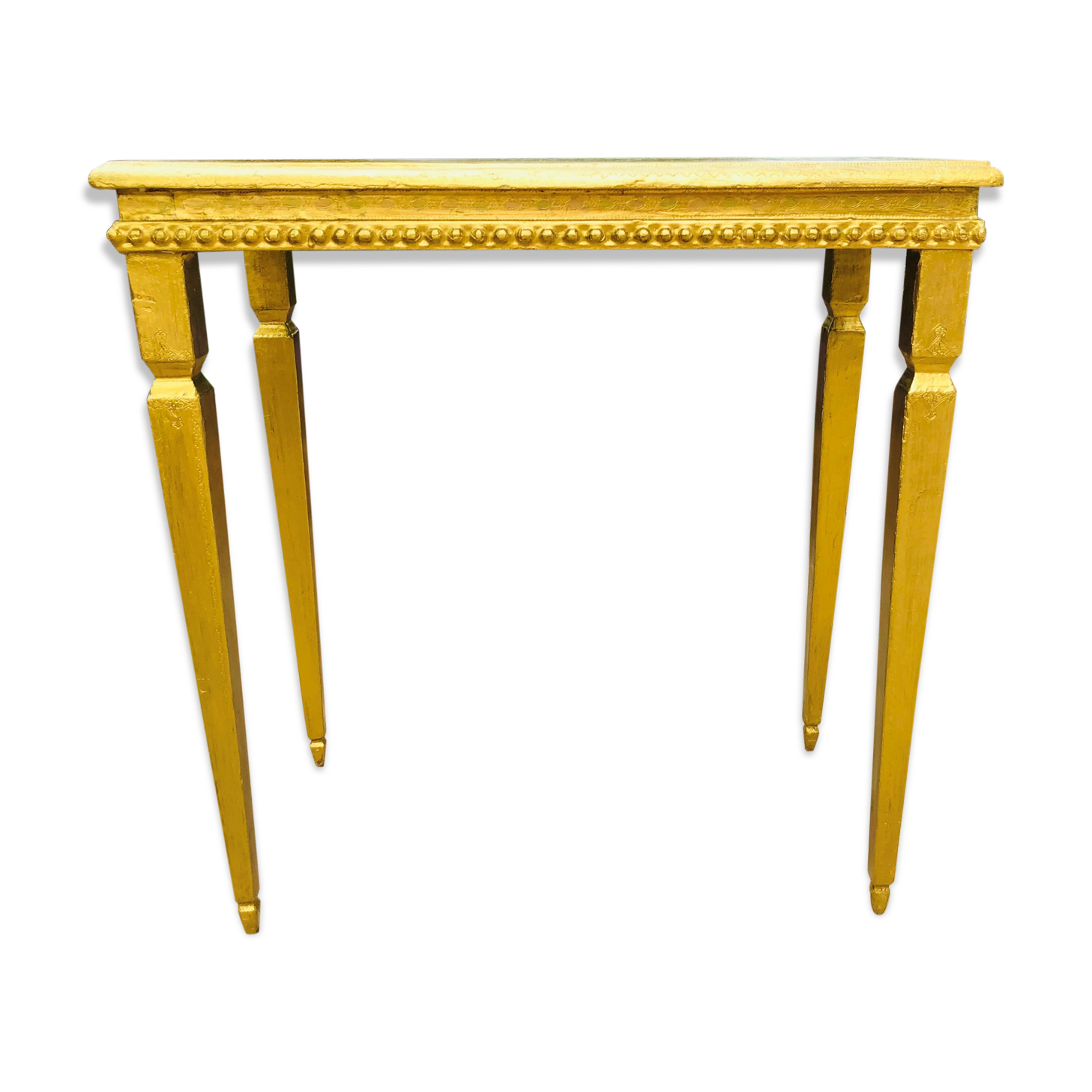 Coffee table in gilded wood