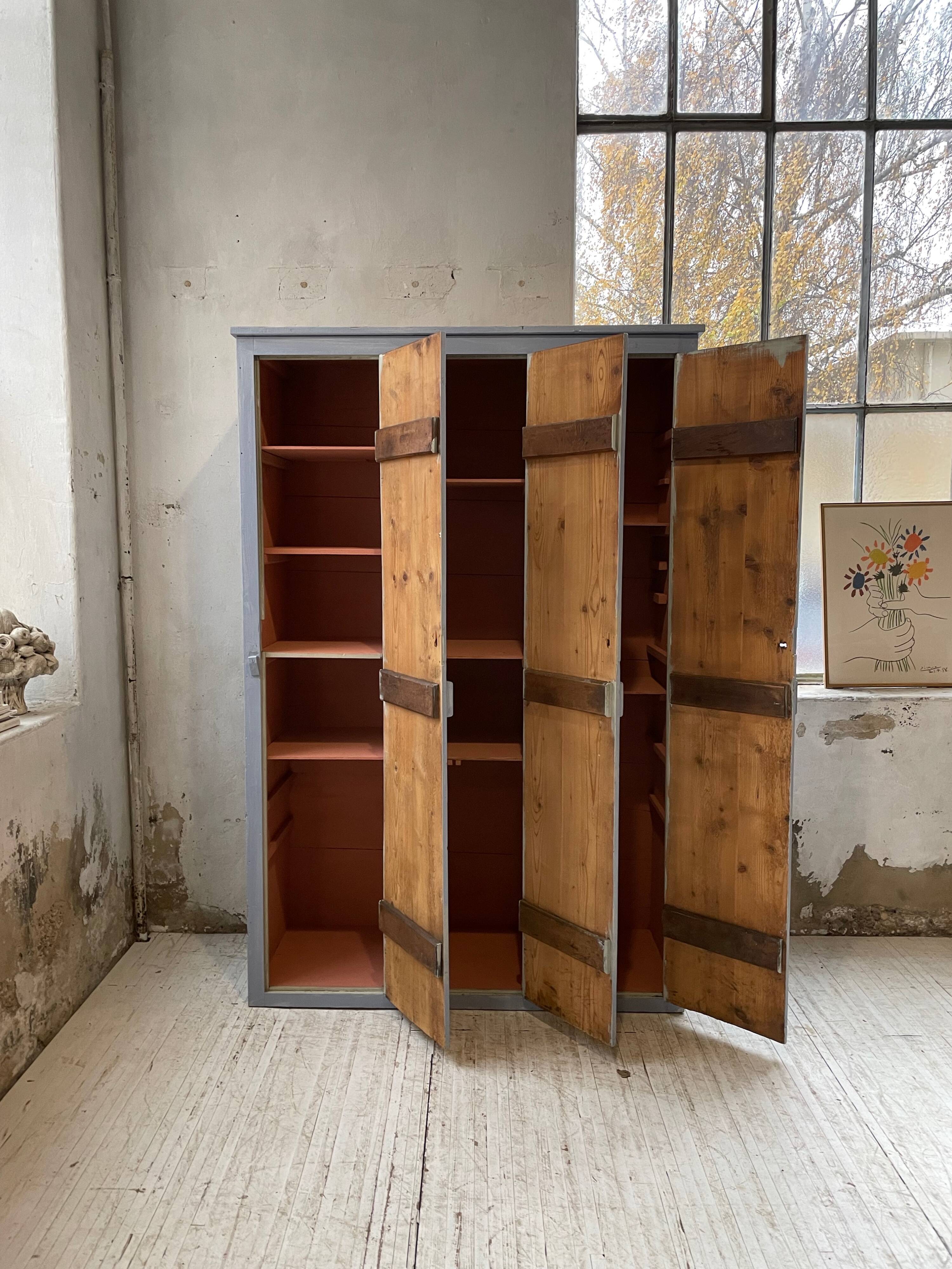 Blue patinated workshop furniture locker room