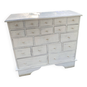 White patinated pine chest of drawers with multiple drawers