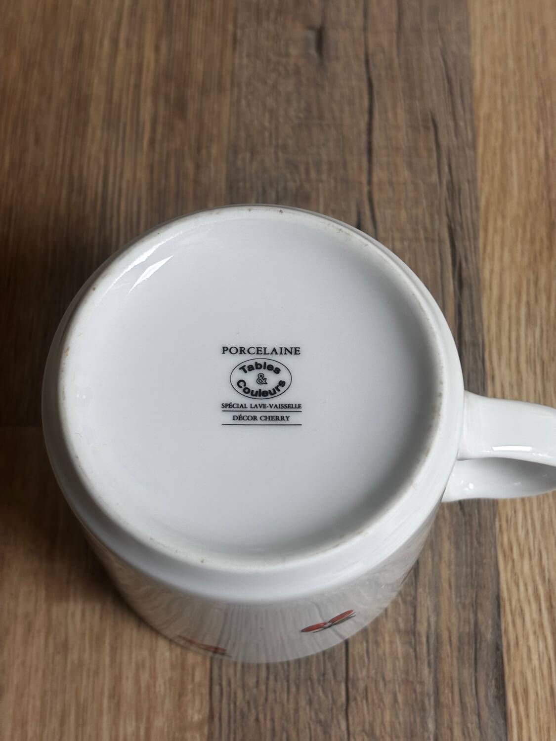 Set of 4 large cherry porcelain cups and saucers.