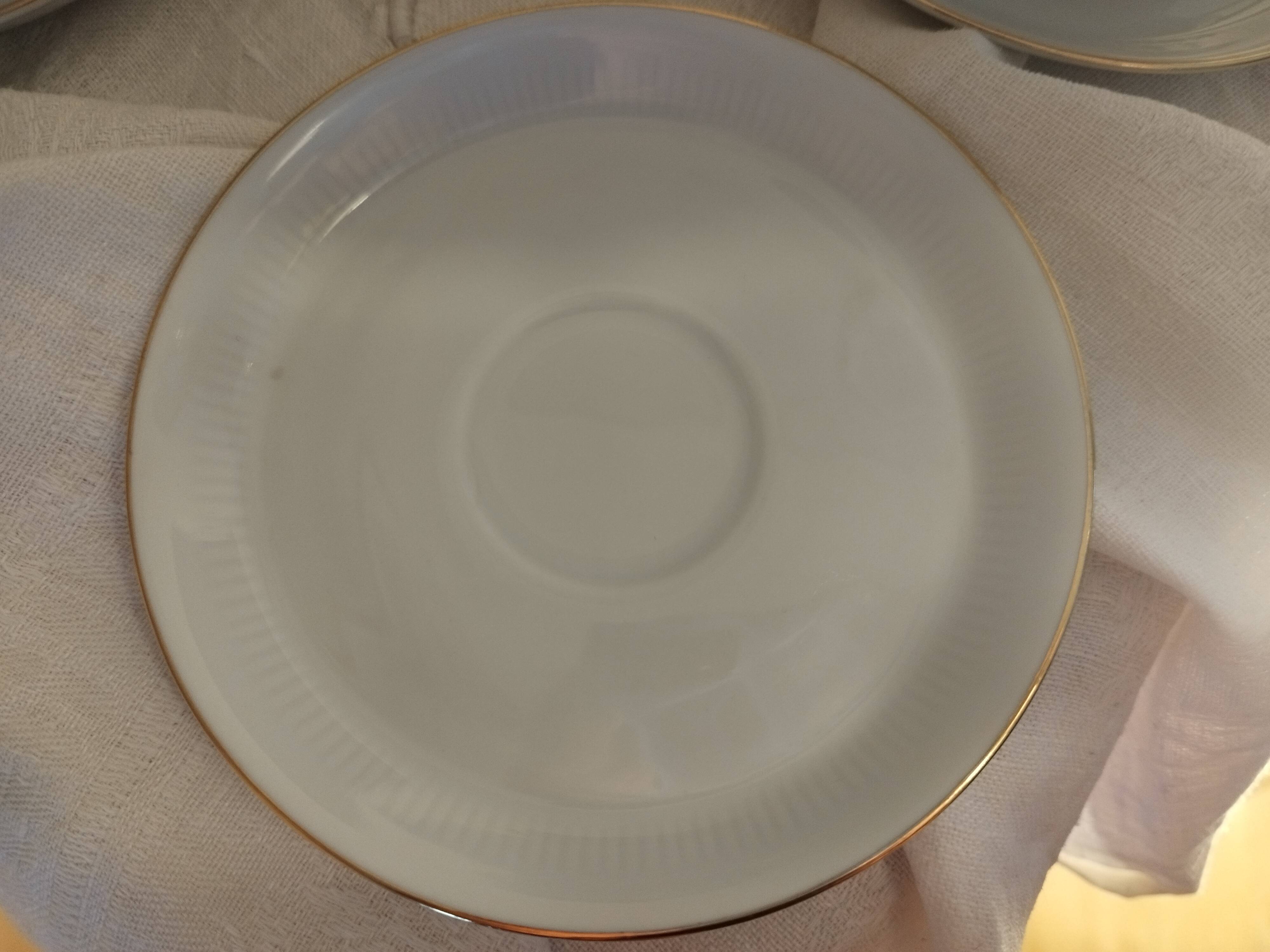 Set of 4 white and gold porcelain cups