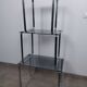Table gigogne inox et verre fumé