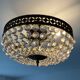 Old ceiling lamp basket with grapevines and bronze