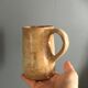 Set of 2 enamelled stoneware jugs