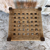 Wooden stool with woven rope seat