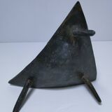 Brutalist metal pocket with patinated tripod