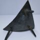 Brutalist metal pocket with patinated tripod