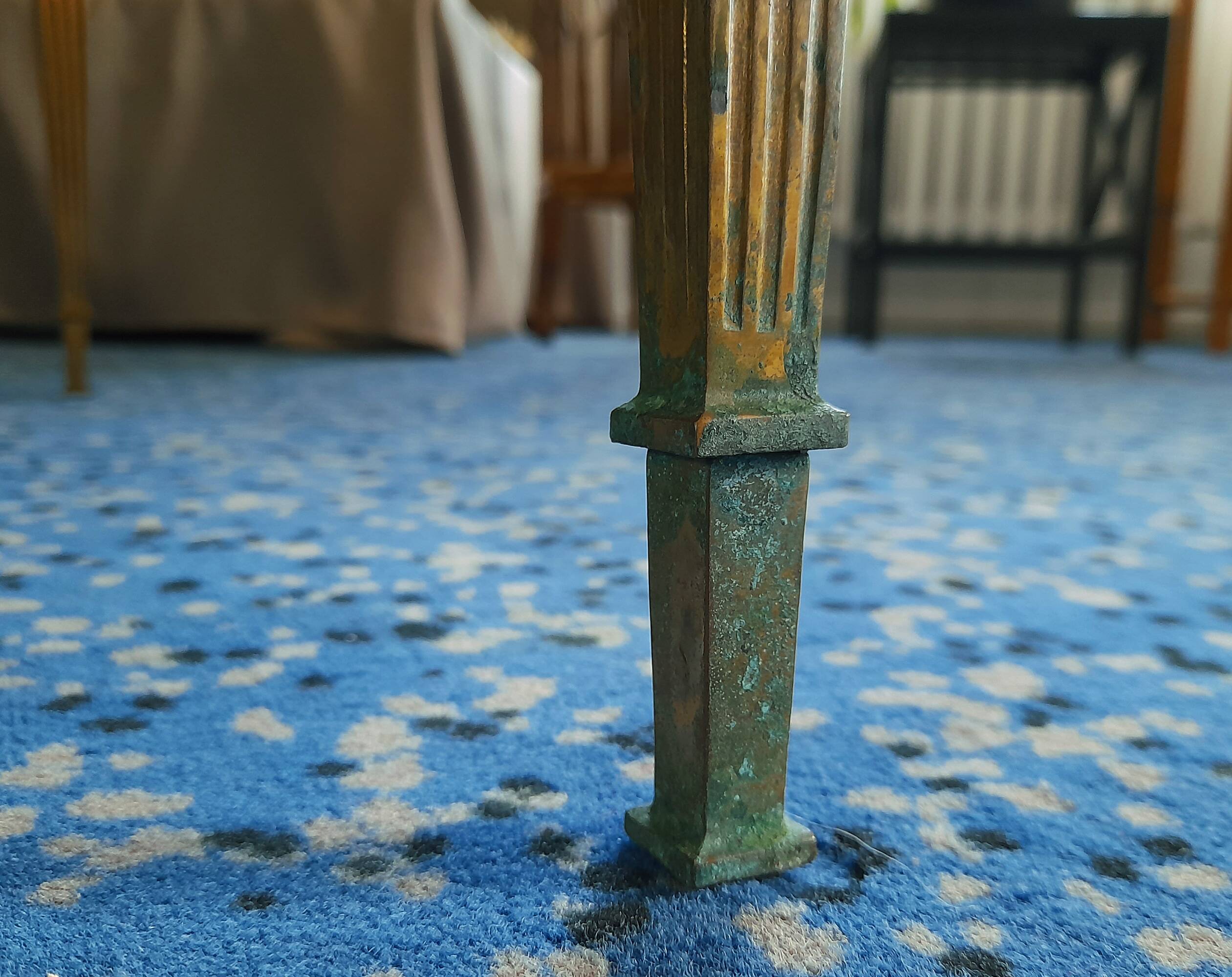 Coffee table in gilded bronze and green Alpine marble