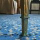 Coffee table in gilded bronze and green Alpine marble