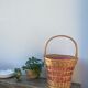 Basket in vintage woven wicker and red gingham