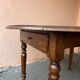 Round wooden folding table
