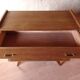 Vintage slanted commode with tapered legs from the 1960s in golden oak.