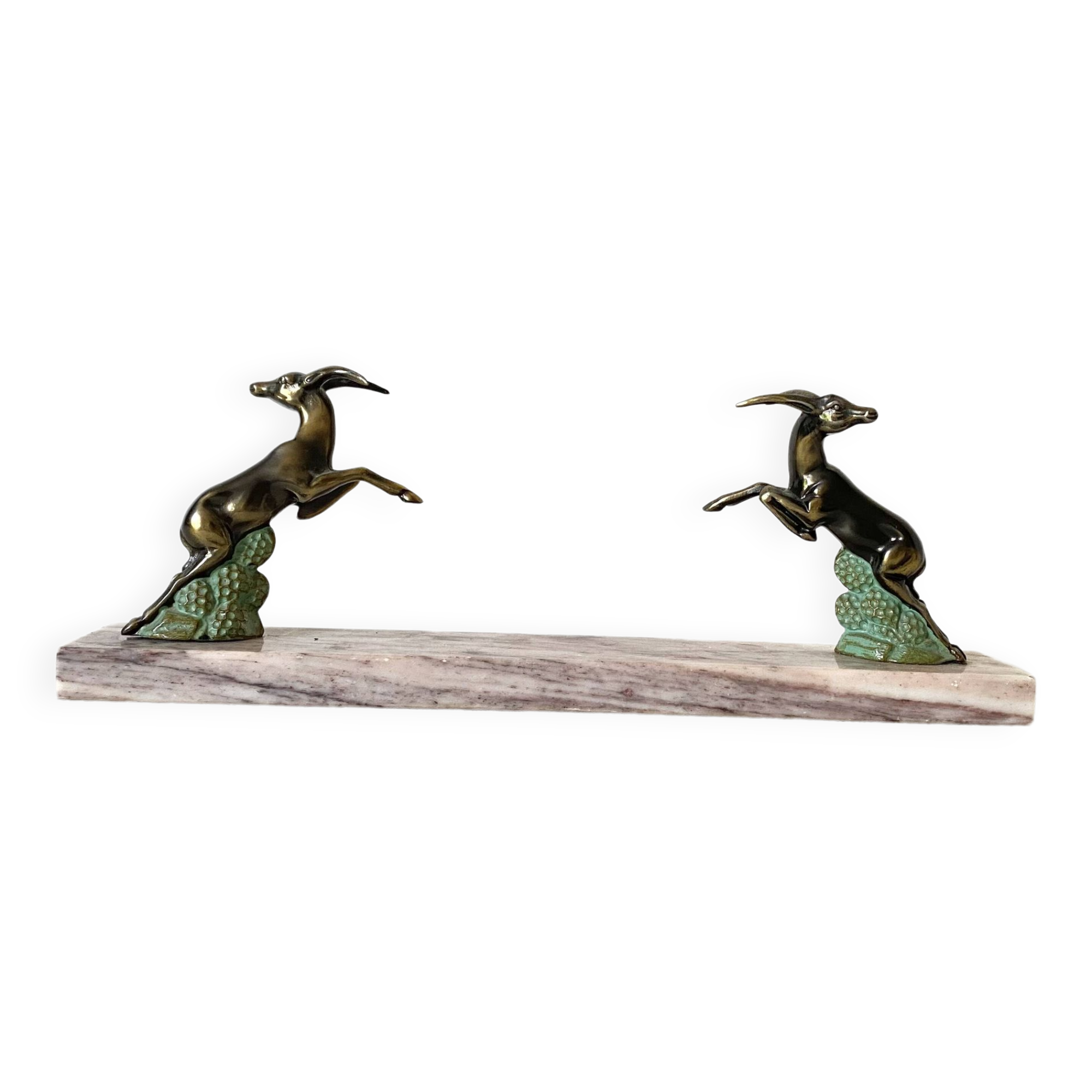 Art deco bookends in pink marble and spelters, antelopes