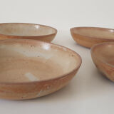 Hollow plates in artisanal terracotta