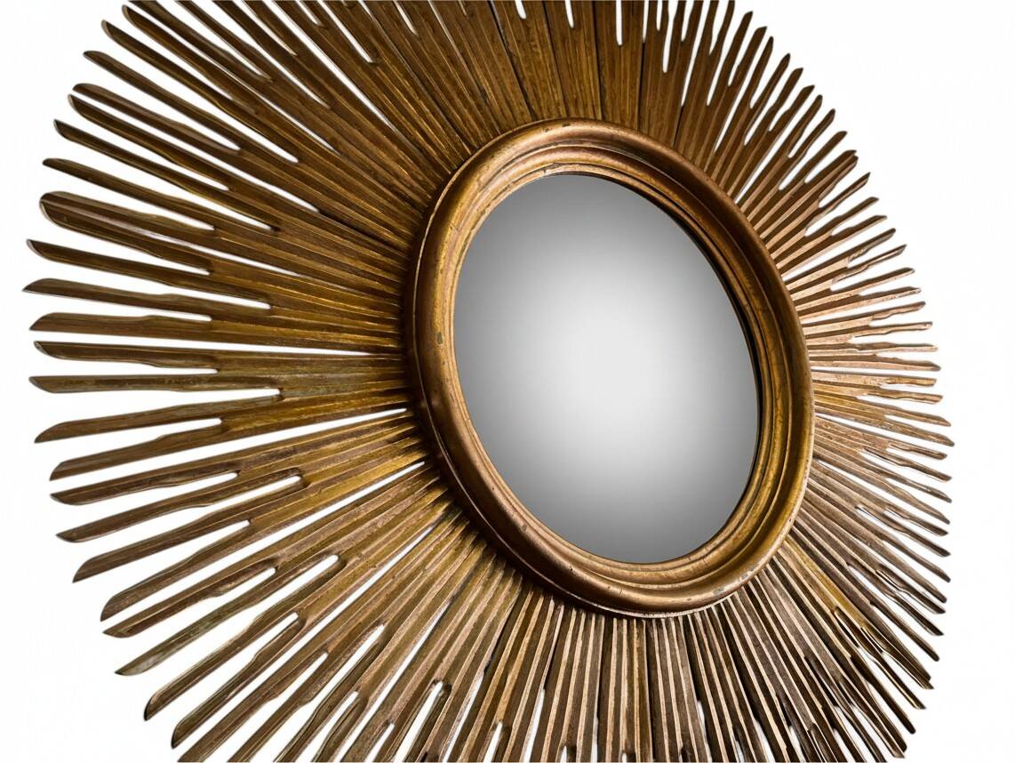 Large sunburst mirror with beveled glass and gilded wood from around 2010.