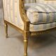 Bergère à oreilles de style louis xvi en bois doré