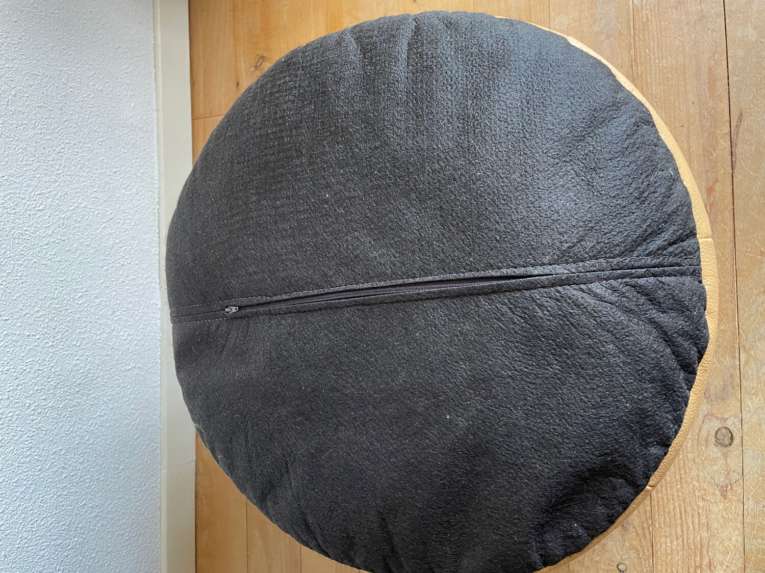 Beige patchwork leather pouf from Sède