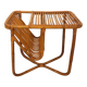 Side table / coffee table with vintage 1960s rattan magazine rack.