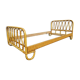 Bed rattan a person