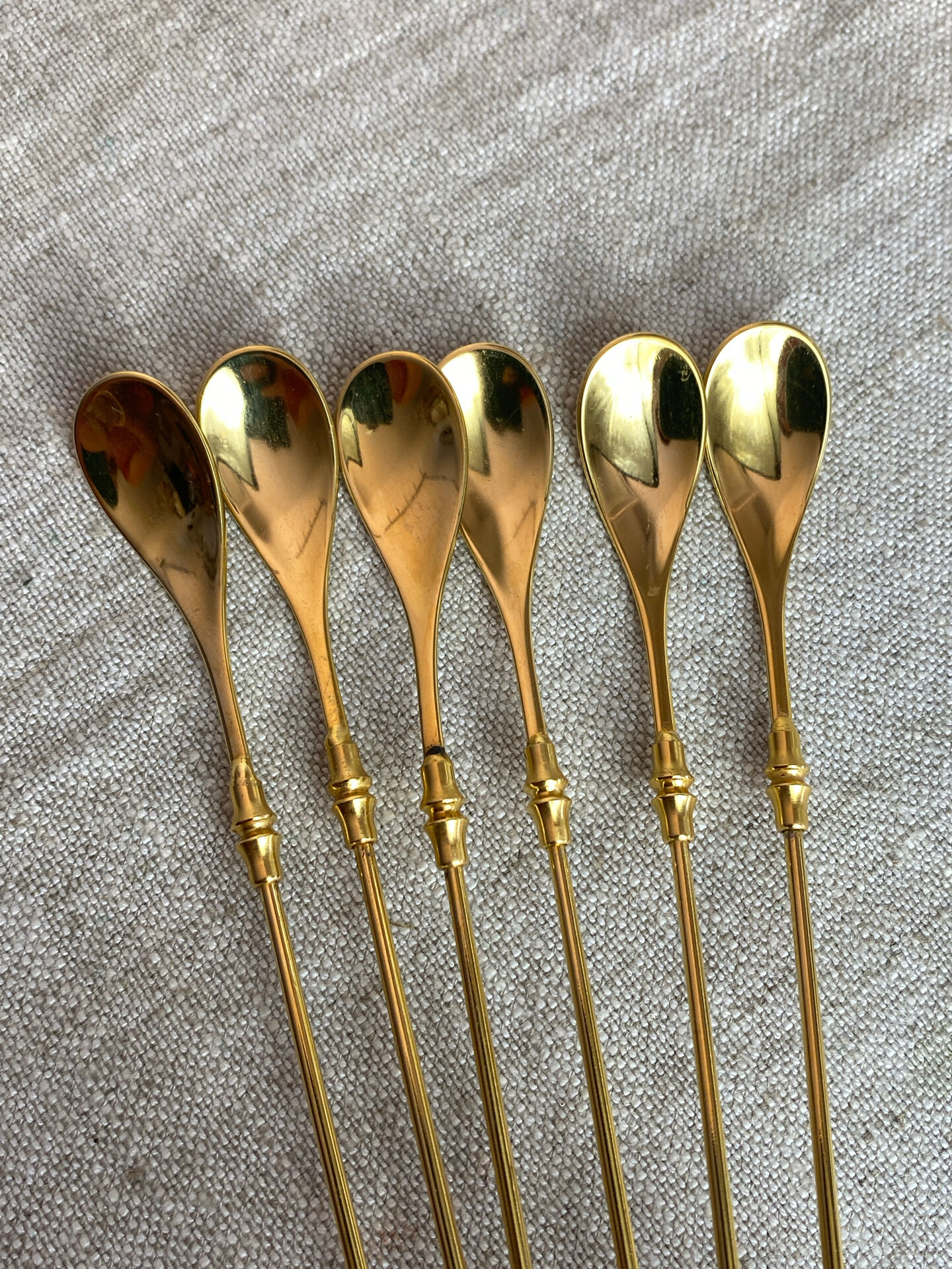 Long coffee or cocktail spoons in gold plating
