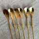 Long coffee or cocktail spoons in gold plating