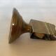 Antique brass match holder with tulip base.