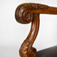 Louis XIII office armchair in leather and walnut carved around 1860