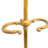 Old brass umbrella door triangular base mounted on column