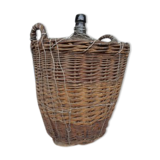 In glass and wicker demijohn