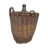 In glass and wicker demijohn