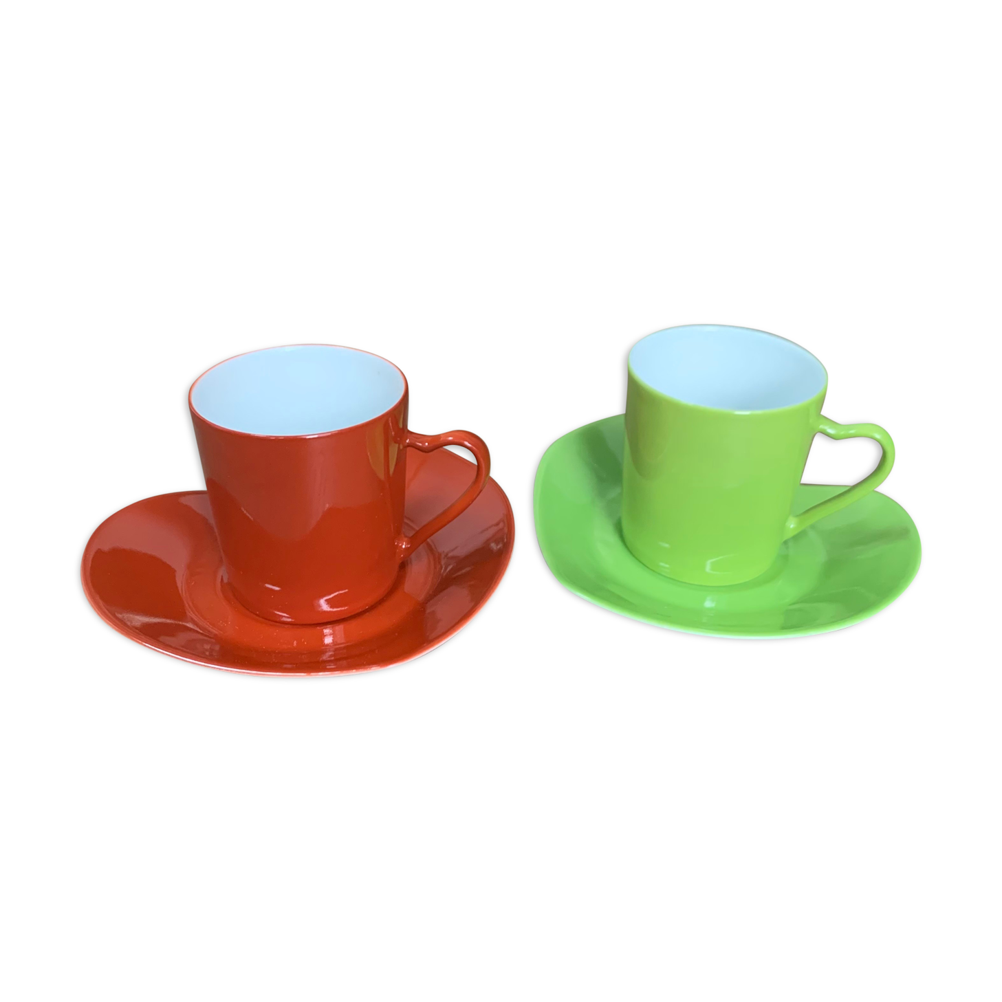 Two cups and saucers in porcelaine Yves Saint Laurent