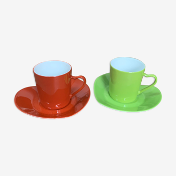 Deux tasses et soucoupes à café en porcelaine Yves Saint Laurent