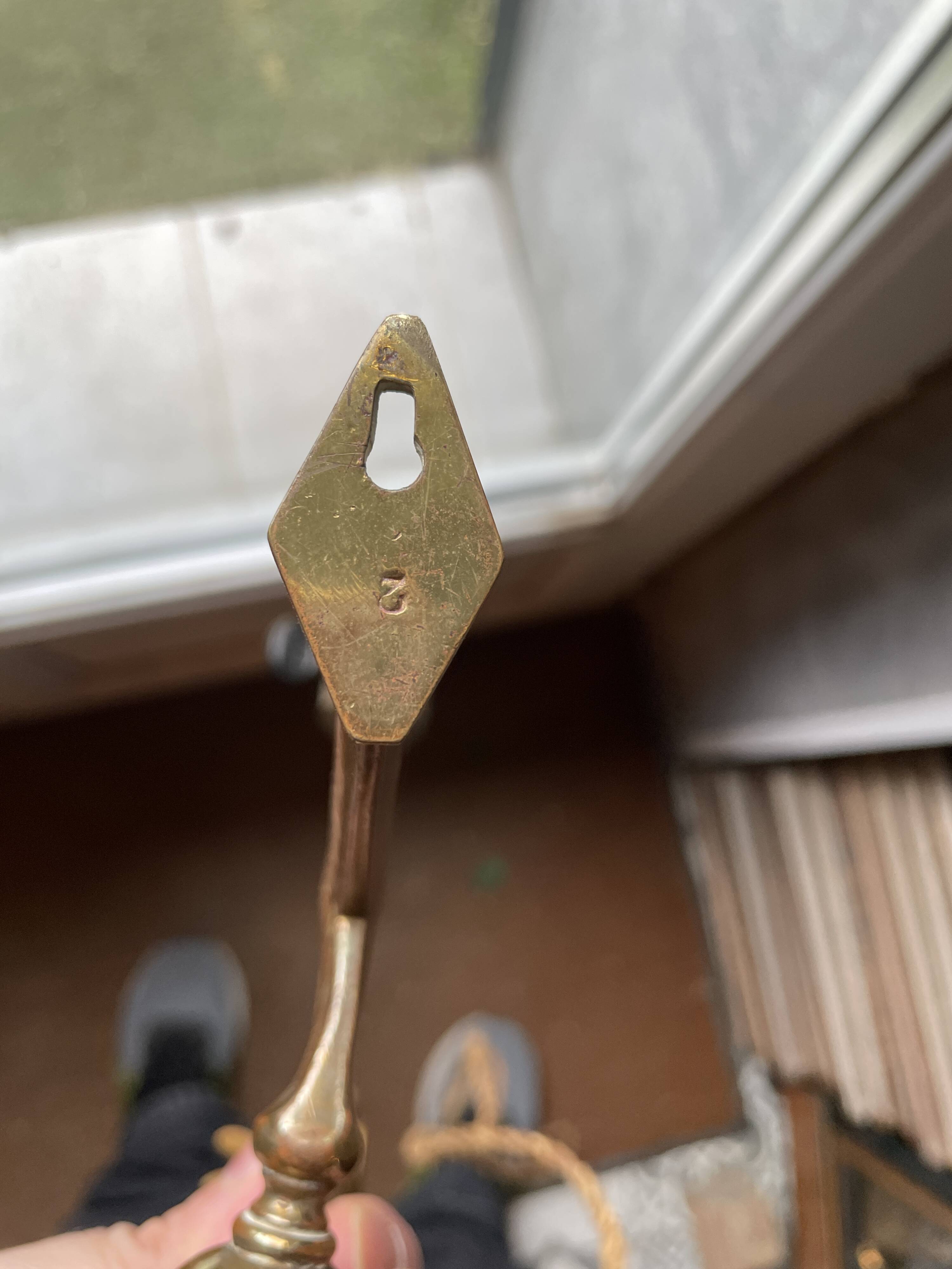 Rare articulated tripod base table lamp in gold-plated brass