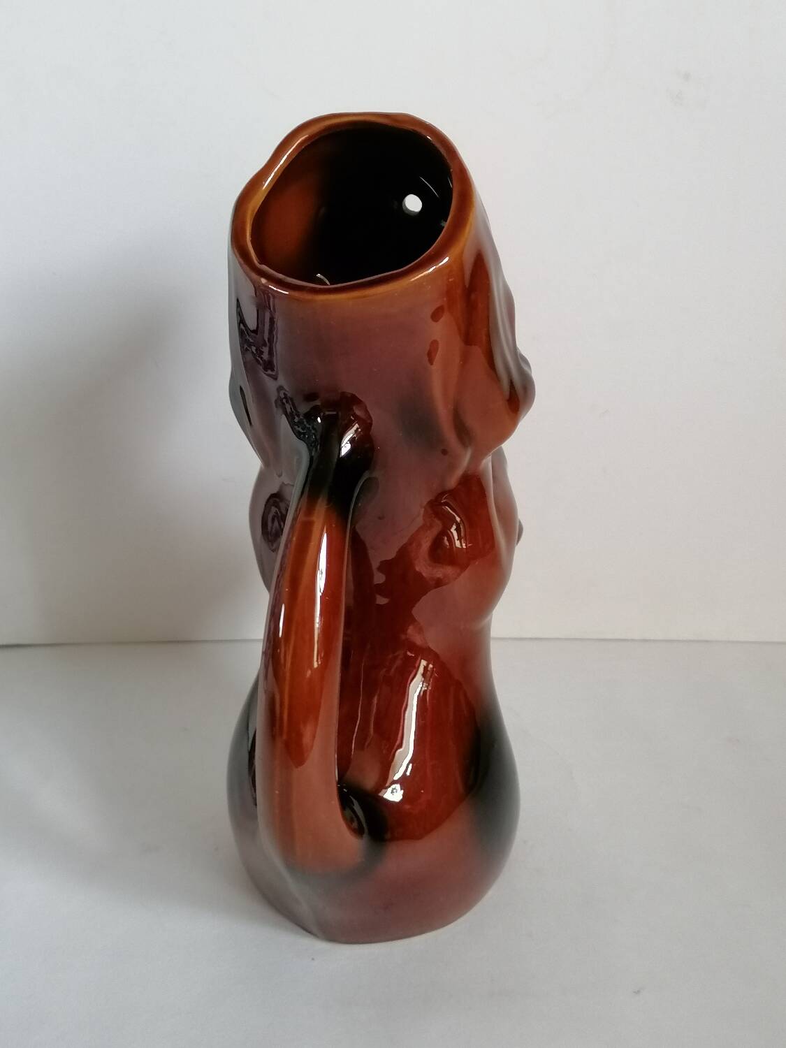 Zoomorphic dachshund dog pitcher in majolica slip