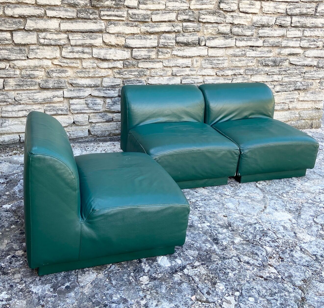 Green leather armchairs
