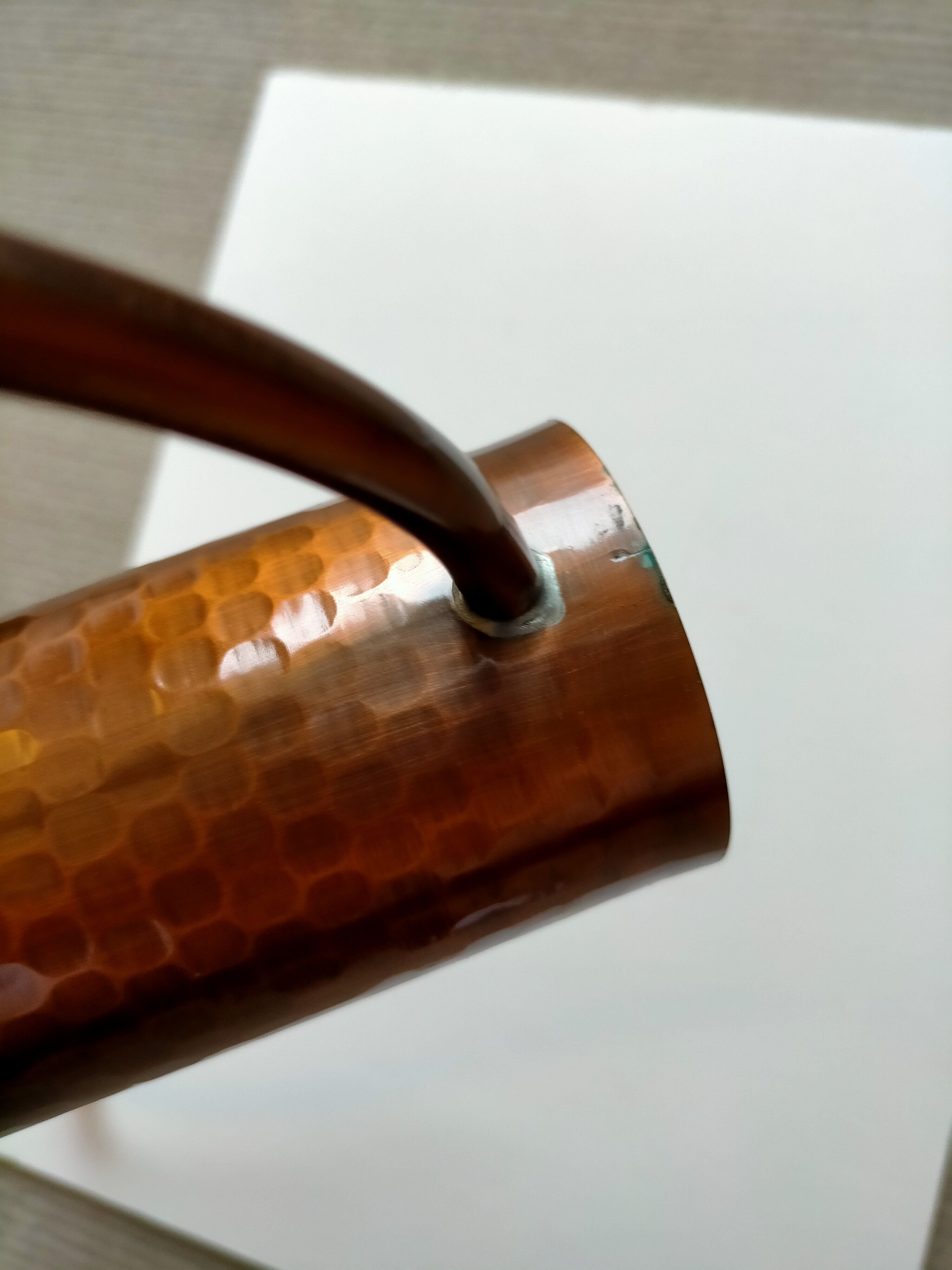 Hammered copper watering can