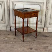 Refreshment table in mahogany, grey marble top, two zinc buckets, 18th century.