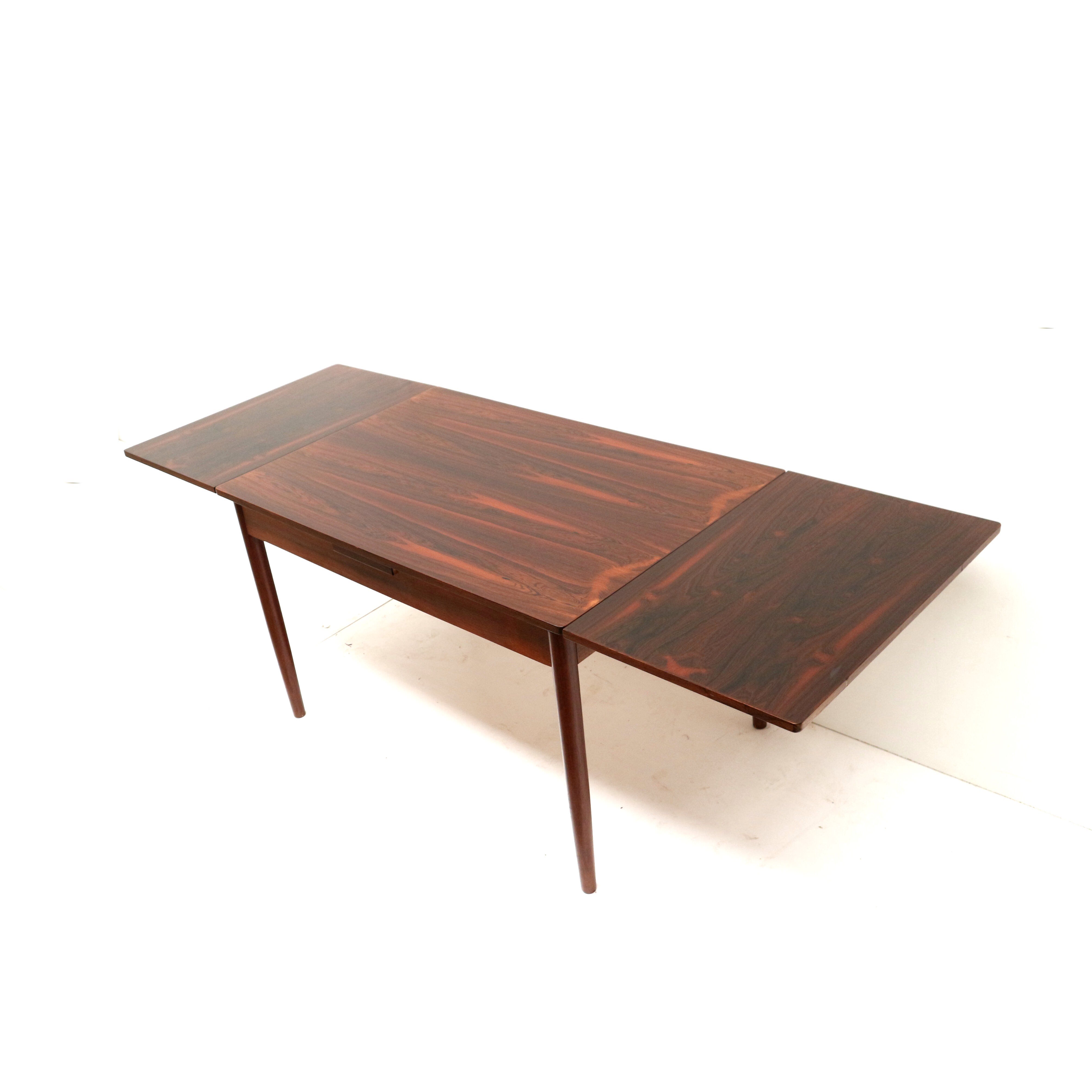 Vintage extendable rosewood dining table made in the 60s