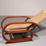 An exceptionally rare mahogany recliner crafted in Italy during the 1950s"