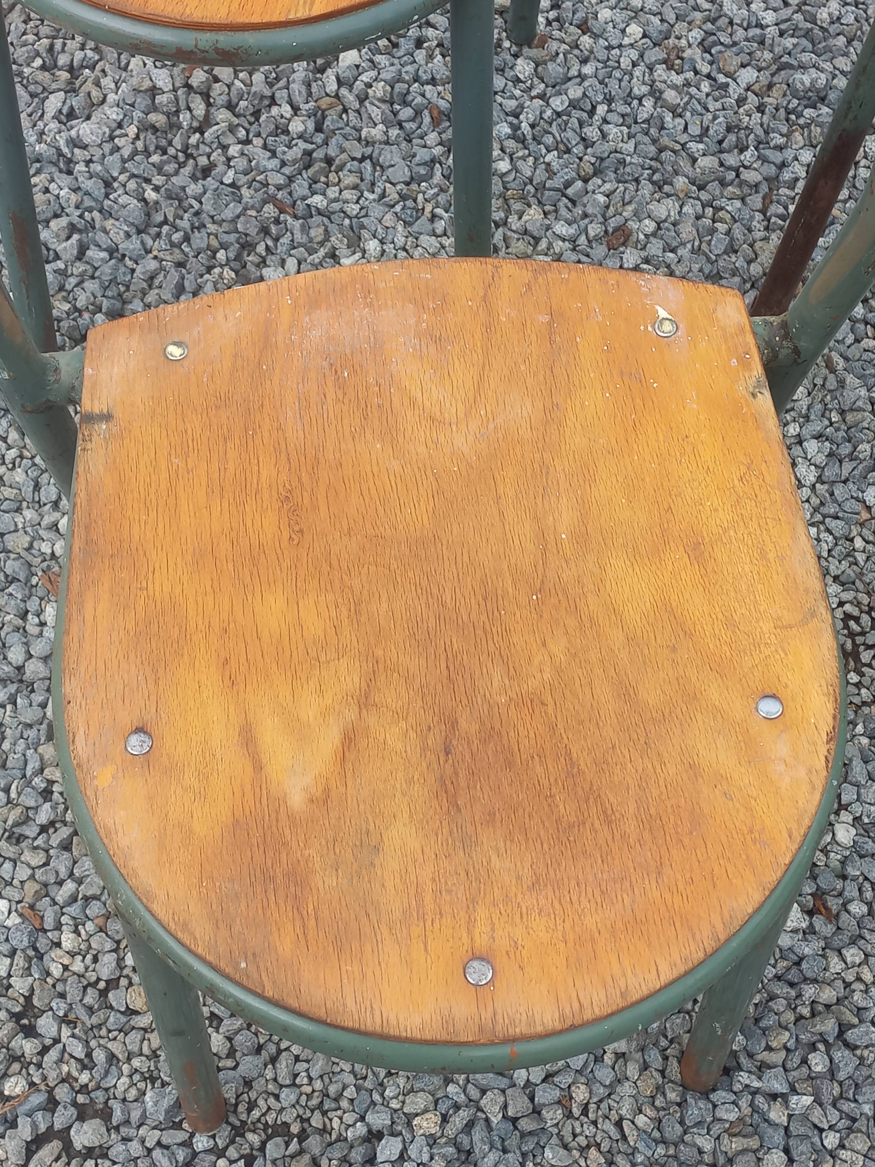 Set de 7 chaises de René Herbst métalliques assises bois