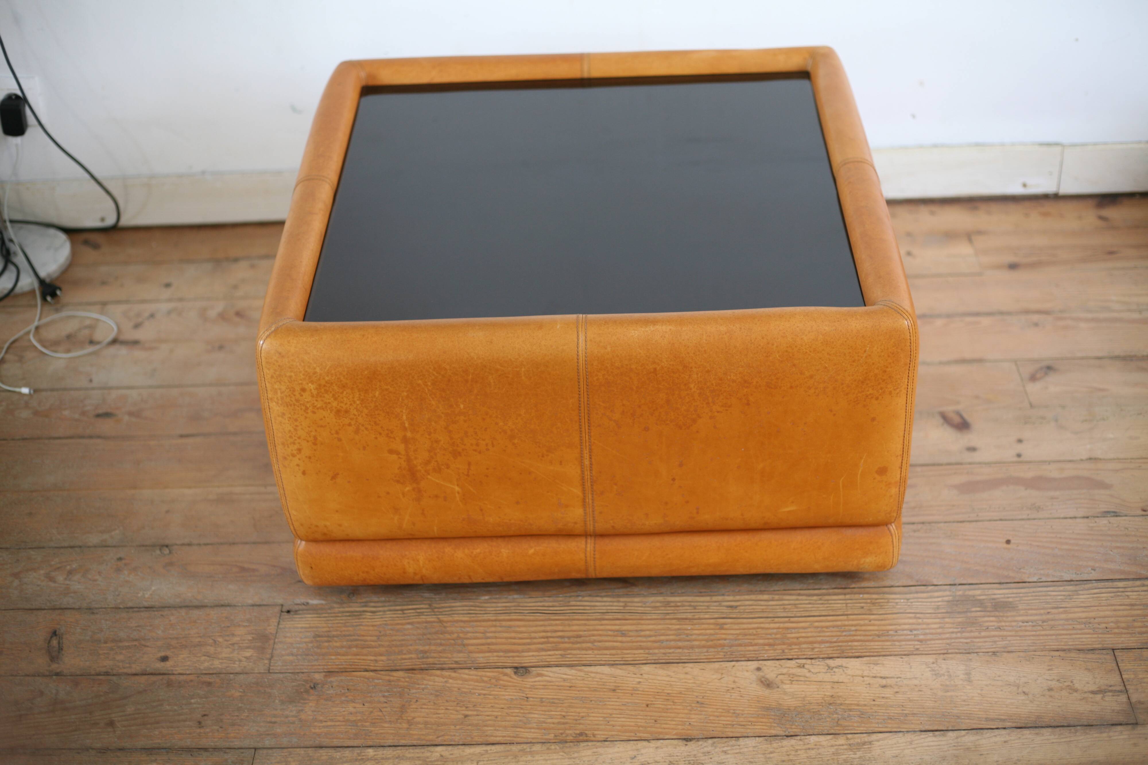 black leather and glass coffee table, vintage design