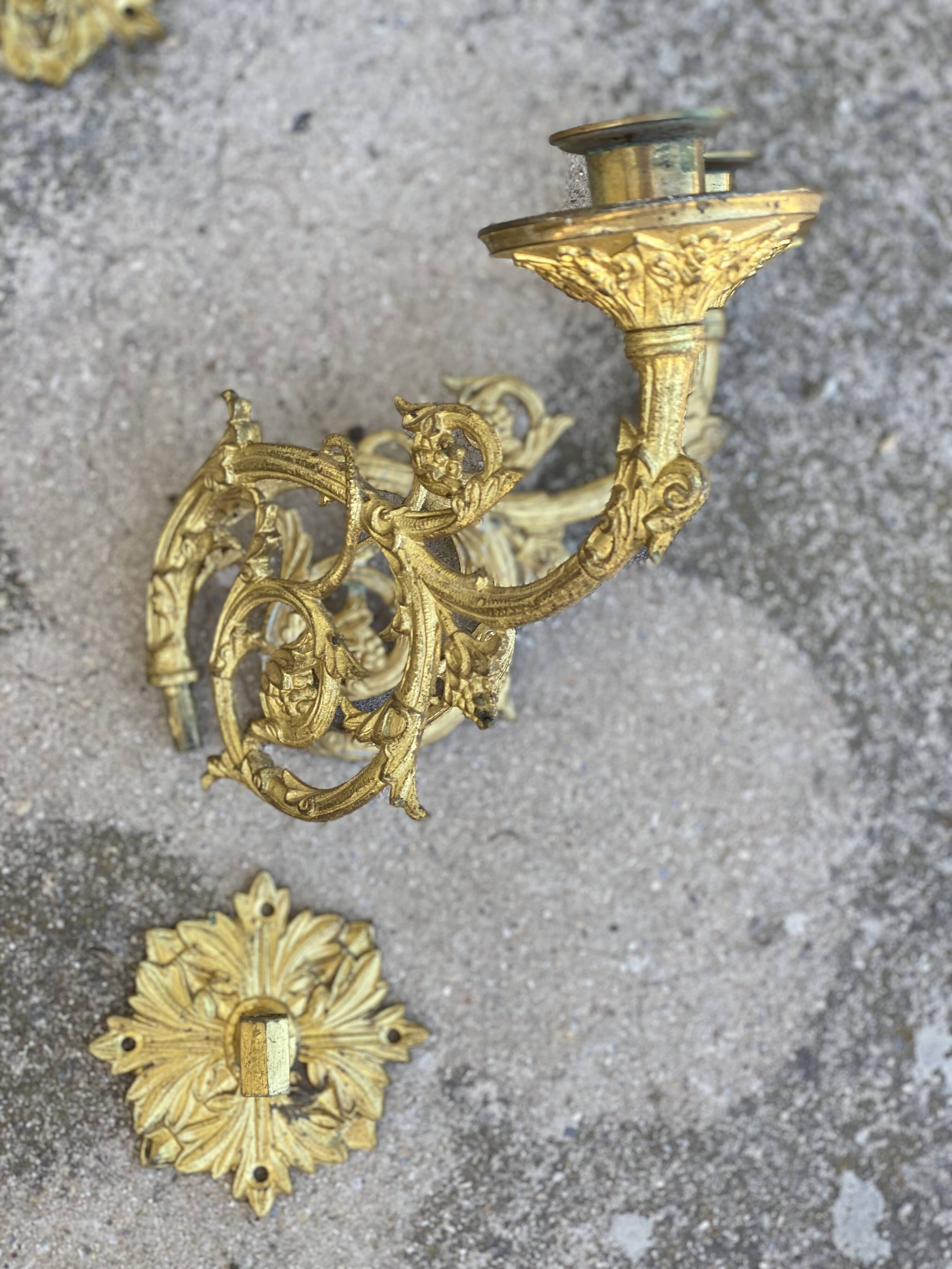 Pair of gilt bronze wall candlesticks